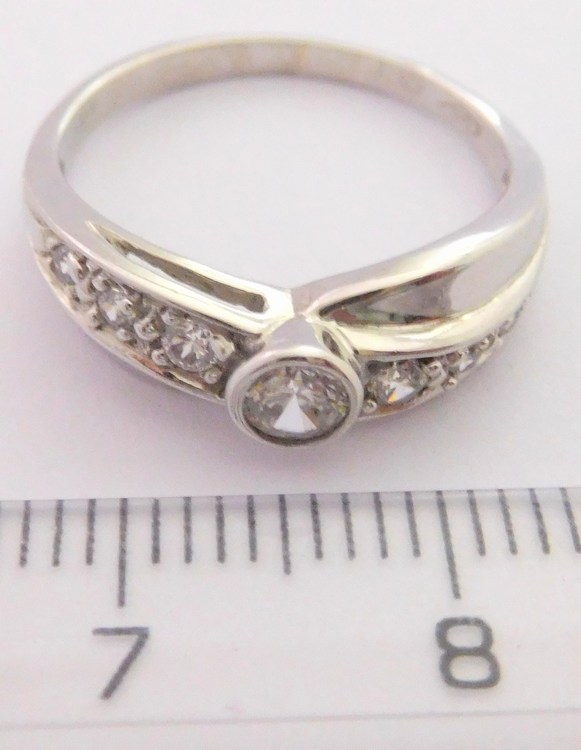 Klenoty Budín Zásnubní prsten z bílého zlata se zirkony 585/2,69gr vel.53 HK1067