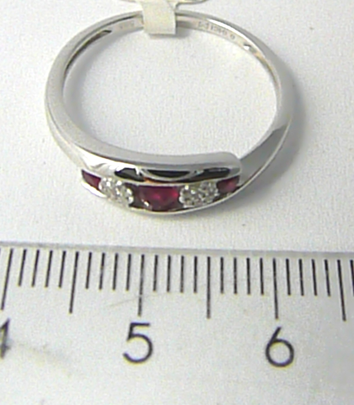 Klenoty Budín Diamantový zlatý prsten z bílého AU s pravými rubíny 3x0,29ct V58 585/2,3gr 3861