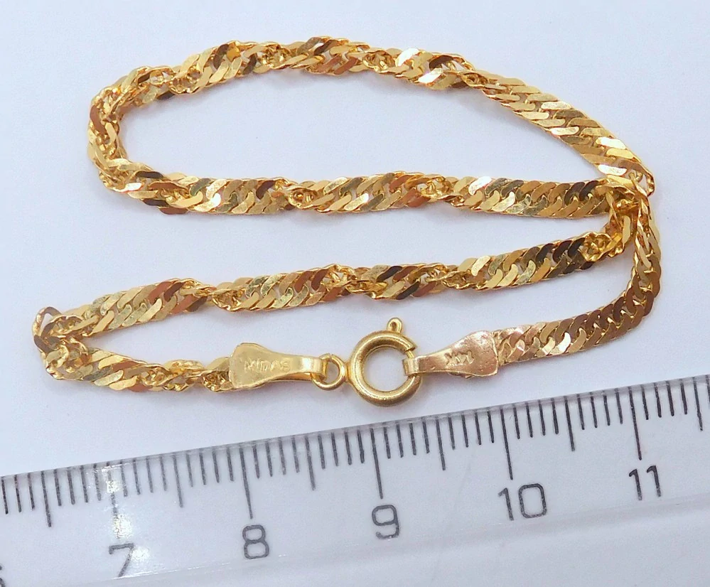 Klenoty Budín Dámský mohutný zlatý náramek TWIST 585/2,62gr 20cm HK7175