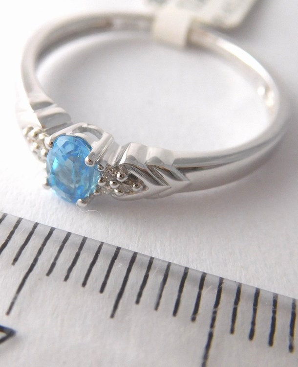 Klenoty Budín Zásnubní prsten z bílého zlata s modrým topazem vel. 57 585/1,97gr 3860450