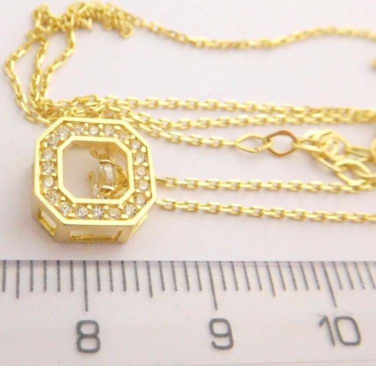 Klenoty Budín Zlatá souprava ze žlutého zlata s pohybujícím se kamínkem (přívěsek) 585/2,32gr 42-45cm HK4005