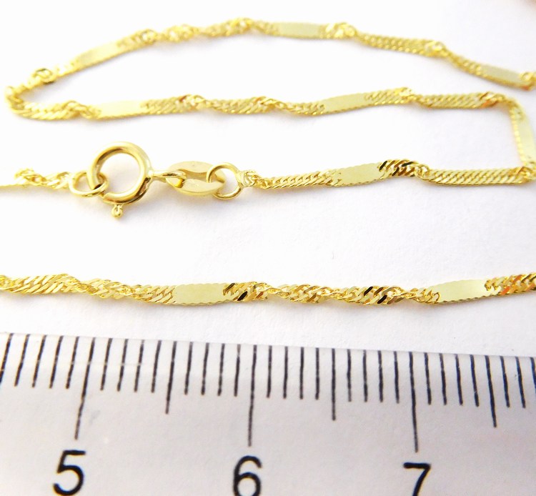 Klenoty Budín Zlatý pevný silný náramek twist s destičkami 585/0,77gr 18cm HK7144