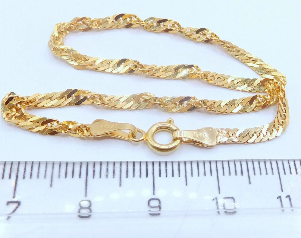 Klenoty Budín Dámský mohutný zlatý náramek TWIST 585/2,62gr 20cm HK7175