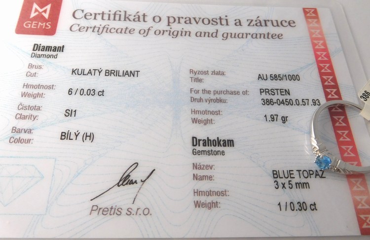 Klenoty Budín Zásnubní prsten z bílého zlata s modrým topazem vel. 57 585/1,97gr 3860450