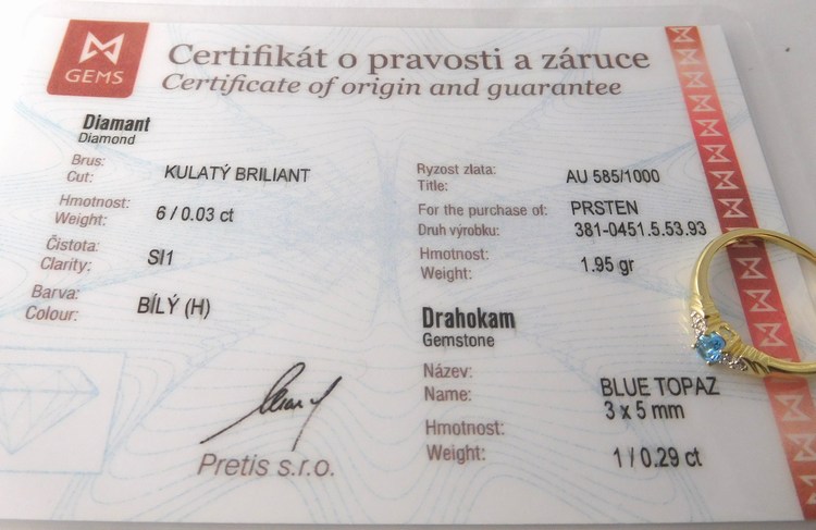 Klenoty Budín Zásnubní prsten ze žlutého zlata s modrým topazem vel. libovolná 585/1,95gr 3810451